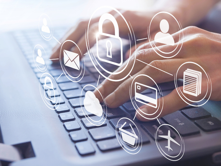 Hands typing on computer with symbols overlaid for security.